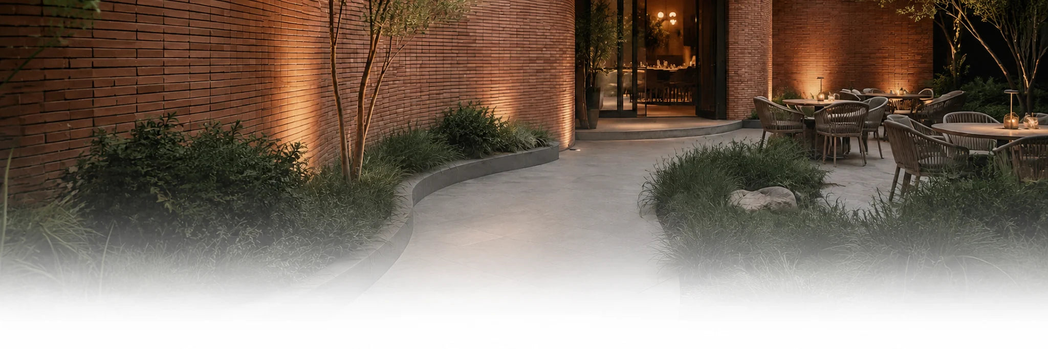 Brick-toned curved restaurant exterior in flexible stone